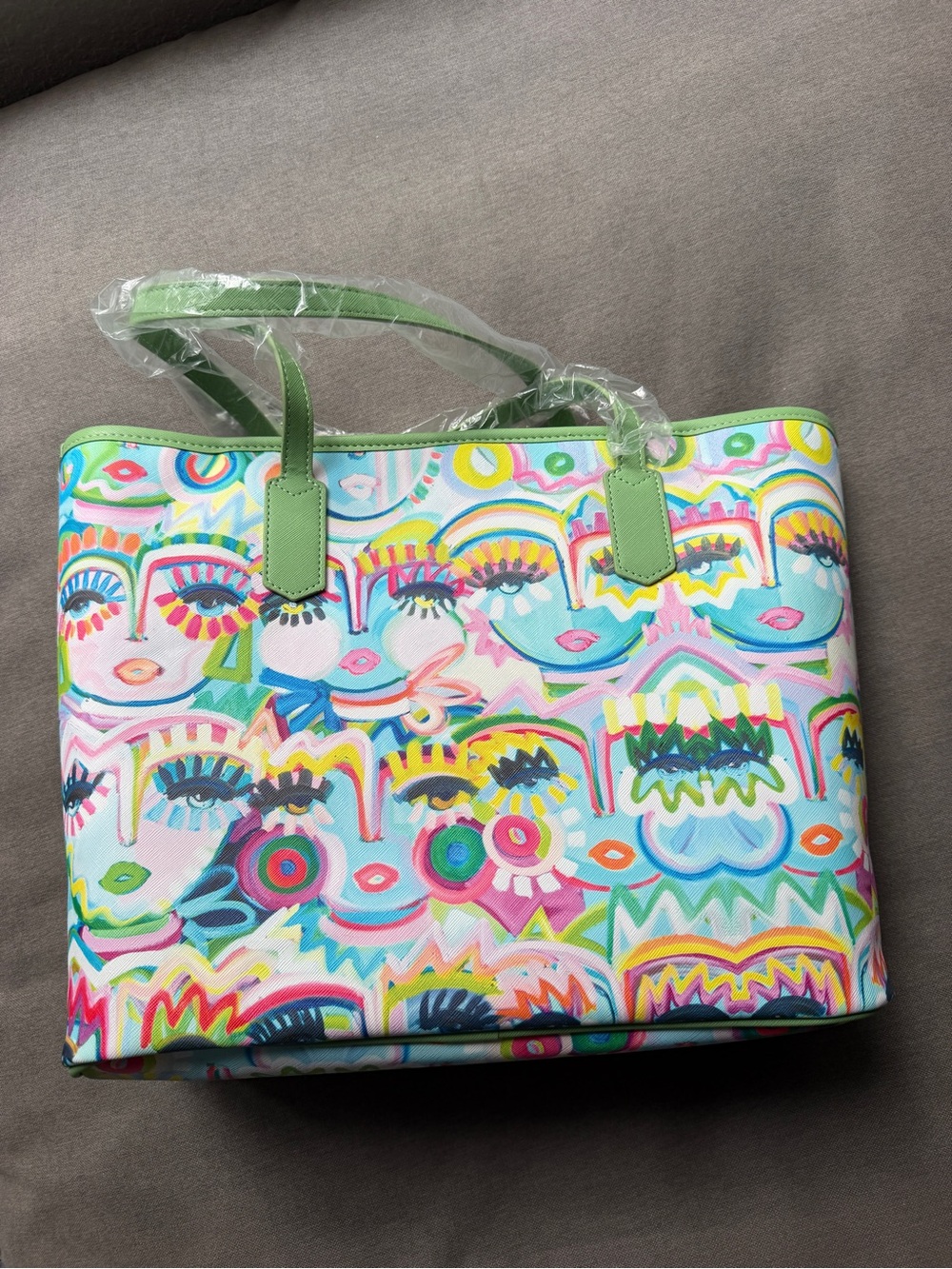 Colorful Abstract Faces Tote Bag in Light Green